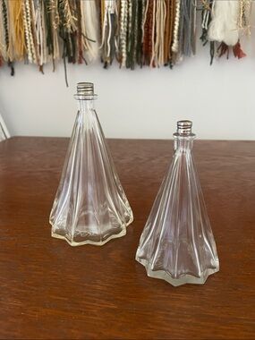 Vintage perfume bottles with lids with star shape base